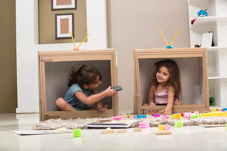 Two girls playing make-believe, showing creativity and spontaneity.